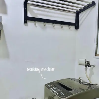 a machine sitting on a counter next to a wall at JAZZ staycation in Manila