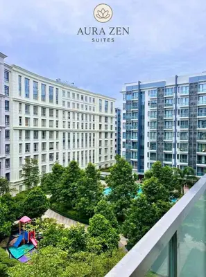 a view of a building with a playground in front of it at Big Studio Unit in Newport near NAIA w Balcony in Manila