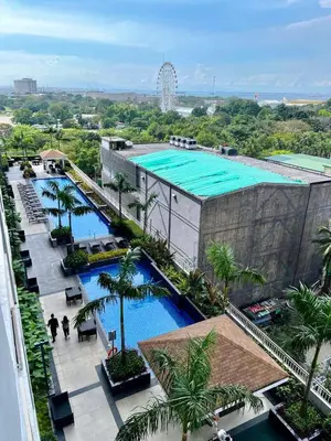 an overhead view of a pool at a resort at Staycation ni Gelo in Manila