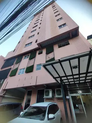 a building with a car parked in front of it at Cozy and Affordable Loft Condo in Manila Center in Manila