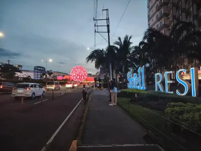 a city street with a sign that reads salt registry at AteAbyPlace648 in Manila