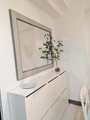 a white dresser with a mirror on top of it at Friends Zone - 2BR condo unit in Mandaluyong in Manila