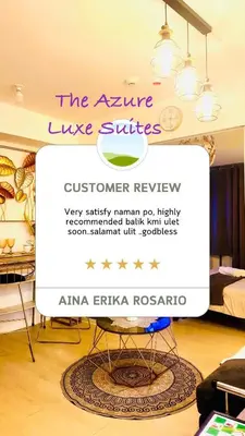 a sign for the arrive live suites in a room at Azure Luxe Suites in Azure Bicutan Near NAIA and MOA in Manila