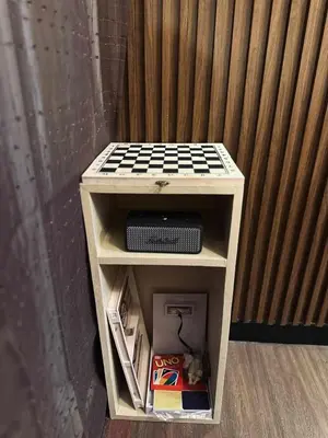 a small table with a speaker on top of it at La Verti Residences Pasay City in Manila