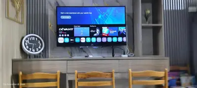 a flat screen tv sitting on top of a entertainment center at 1BR Romantic guest room at Shore Residences, Pasay Near MOA & Airport in Manila