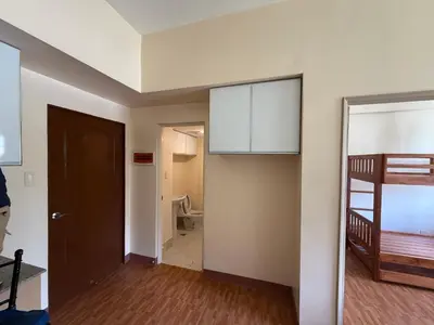 a room with a door and a room with a bunk bed at Manggahan General Trias Cavite in General Trias