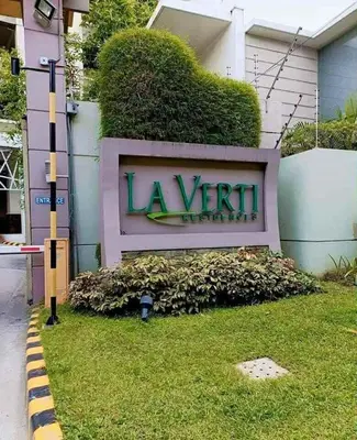 a sign for a la vinilla hotel at 1BR LaVerti Minalist affordable family staycation in Manila