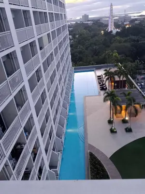 an overhead view of a building with a swimming pool at Boho Cove PH in Manila