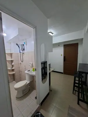 a bathroom with a toilet and a sink at Pod 520 in Manila
