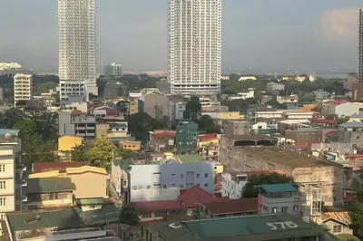 a view of a city with tall buildings at La Verti Residences 1524 in Manila