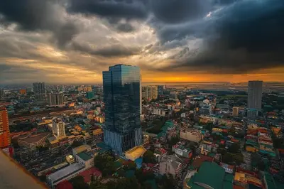 a view of a city with a tall building at La Verti Residences 1520 in Manila