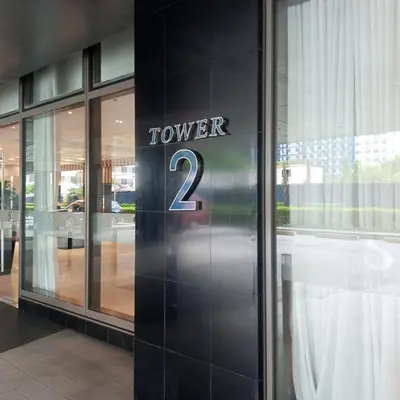 a door with the number on it in a building at Modern MOA Escape, Work, Chill & City Views in Manila