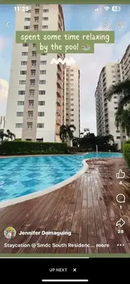 a screenshot of a website with a picture of a pool at SMDC South Residences in Manila