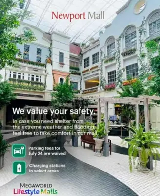 a advert for a newport mall in front of a building at Walkable to and from NAIA 3 and Resorts World in Manila