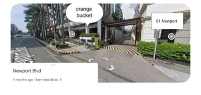 a rendering of an empty street with a sign at Walkable to and from NAIA 3 and Resorts World in Manila