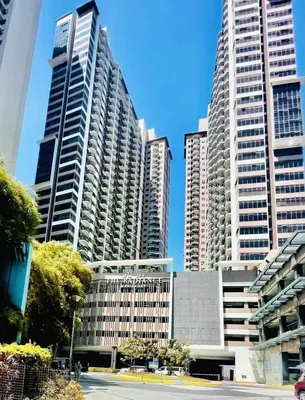 a group of tall buildings in a city at Urbanstay at The Radiance Manila Bay in Manila