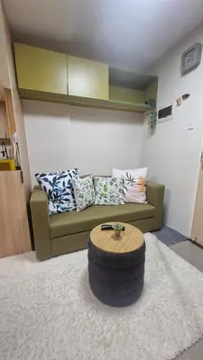 a living room with a couch and a coffee table at Kage-no-Wa Suite Netflix, Disney, HBO 2BR in Manila