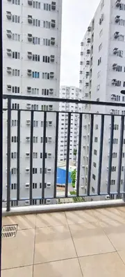 a view from a balcony of tall buildings at Stand out and cozy condo unit at Shore 2 Tower 3 in Manila