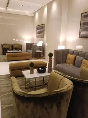a living room with couches and a table and chairs at Manila Airport Hub near NAIA T3 -101 Newport Boulevard in Manila