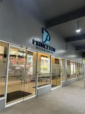 a entrance to a furniture store with a sign on the wall at Osaka Theme LRT Gilmore Robinsons Magnolia Free Netflix Internet Pool in Manila