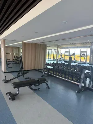 a gym with treadmills and exercise equipment in a building at Sy bay Suites TwinBed near Okada MOA PITX NAIA cod MSV1502H in Manila
