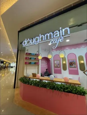 a dunkin donuts store in a shopping mall at Cozy Escape by Dave 4265 in Manila