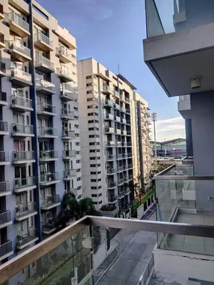 a view of some apartment buildings from a balcony at Big Studio Condo Across Manila Airport NAIA T3 WITH WIFI in Manila