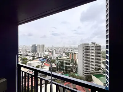 a view of a city from a balcony at Skyline Serenity Designer 1BR with Balcony at Air in Manila