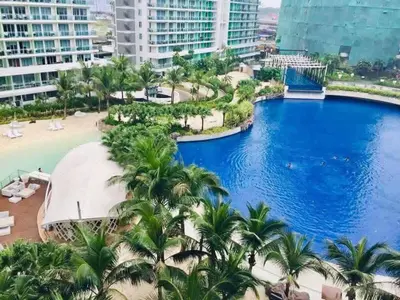 a view of the pool at the resort or nearby at Masie Beach Staycation in Manila