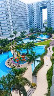 an aerial view of the pool at the paradiso resort at MOA Shell Residences Staycation in Manila