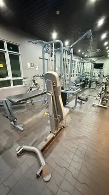 a gym with several tread machines in a room at Best Value-Beautiful 1BR in the Heart of Makati w WiFi, washer-dryer, pool & gym in Manila