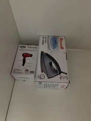 a computer mouse in a box on a table at Greece Theme Boni MRT Train Edsa 1BR with Netflix Fast Internet Pool Light Mall in Manila
