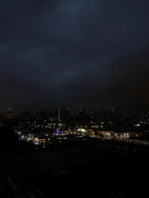 a night view of a city with lights at E&T staycation in Manila