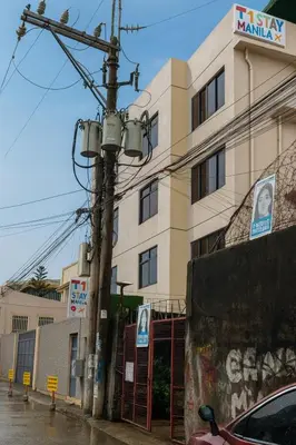 a building on the side of a street at T1 Stay Manila-Near NAIA Manila Airport and PITX in Manila