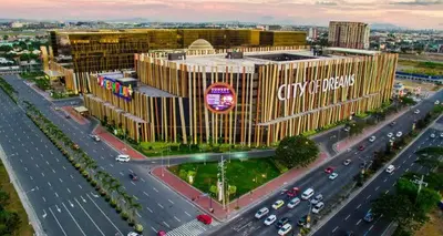 an overhead view of a large building with a highway at Sybay Suites twin double bed beside Okada near T3 MOA NAIA Ayala MSV1517H in Manila
