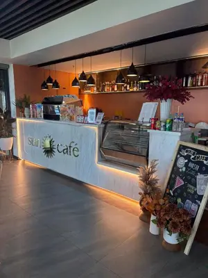 a fast food restaurant with a counter with a counter sidx sidx sidx at Sybay Suites twin double bed beside Okada near T3 MOA NAIA Ayala MSV1517H in Manila