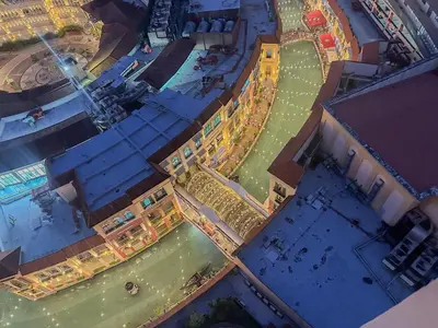 an overhead view of an amusement park at night at nJoy! Tropical Breeze at Venice Grand Canal in Manila
