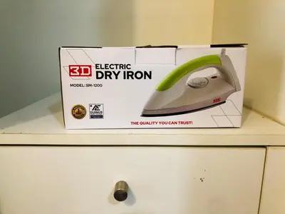 a computer mouse in a box on top of a drawer at Charming 1BR with Balcony near Venice mall&BGC in Manila
