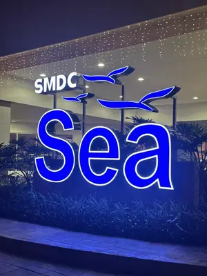 a large blue sign that says sno gas at AMD Staycation in Manila