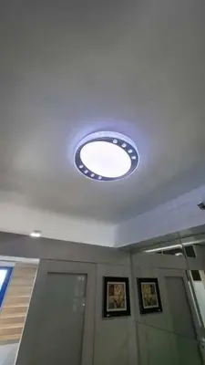 a ceiling with a light in a room at Sea Residences in Manila