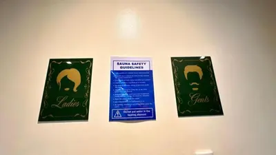 two packets of toothpaste and a sign on a refrigerator at AdahkuMaya Luxury Suites in Manila