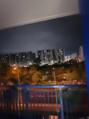 a view of a city skyline at night at Sea residences MOA-MR in Manila
