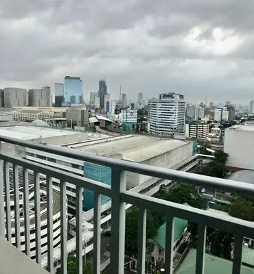 a view of a city from a balcony at 320 Santorini Staycation in Manila