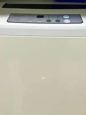 a stove top oven sitting on top of a counter at City Comfort Studio at Sunshine 100 in Manila
