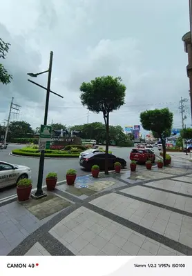 a street with cars parked in a parking lot at 150 Newport Boulevard Condominium - North Wing in Manila