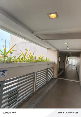 a hallway with plants on the side of a building at 150 Newport Boulevard Condominium - North Wing in Manila