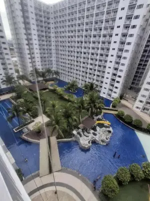 an aerial view of a water park in a city at 2 Bedroom Shore Residence Mall Of Asia Complex in Manila