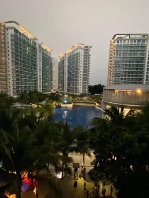 a view of a city with tall buildings at Positano Tower Beach view with PS4 - Azure Parañaque Resort in Manila