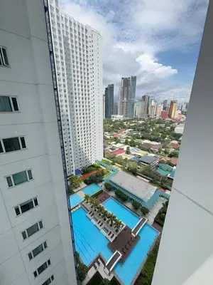 an aerial view of a building and a pool at Jazz Luxe Getaway in Manila