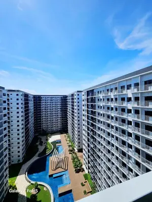 an aerial view of a large apartment complex at Cozy Modern Condotel in Pasay Near MOA & Airport in Manila